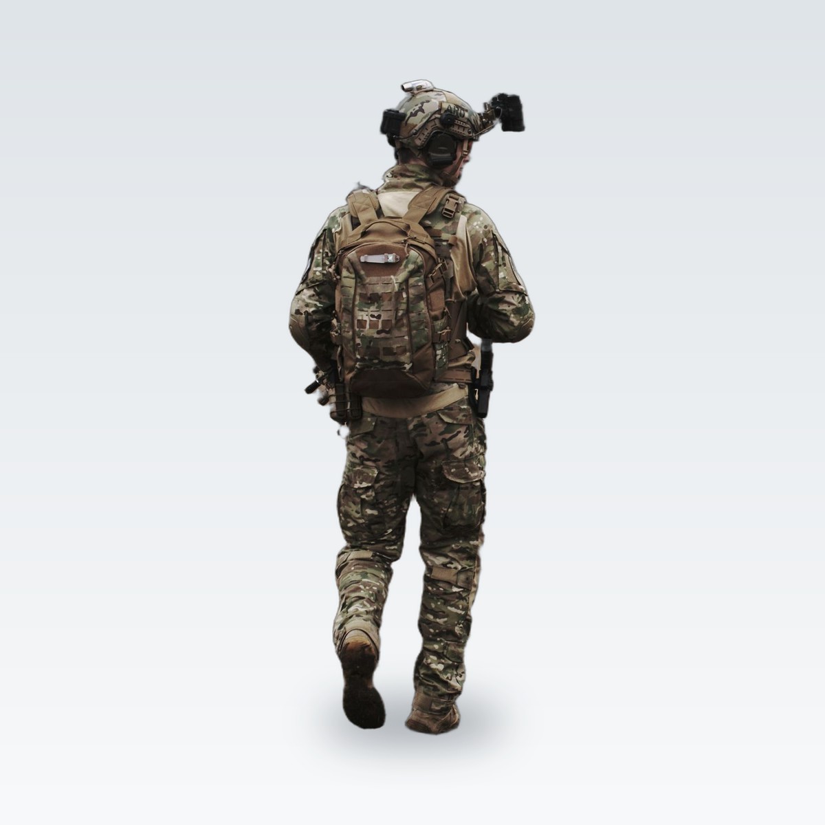 A soldier in camouflage field uniform with a pack, seen from behind