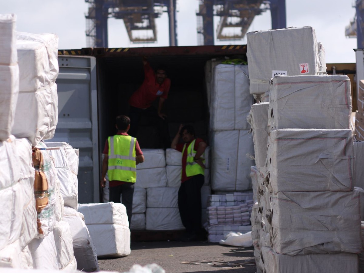 Cartons being loaded into a container